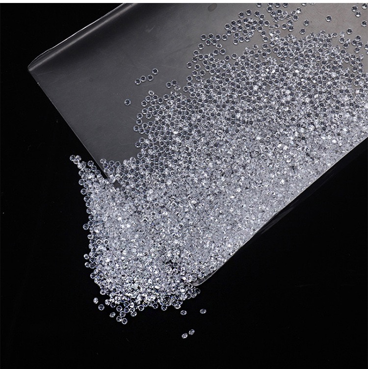 Colourless D–F lab-grown melee diamonds, 0.10 ct on black velvet